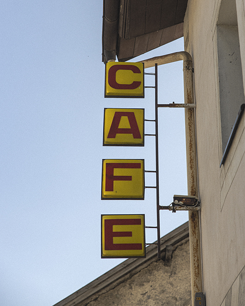 A café sign in the Italian village of San Valentino alla Muta