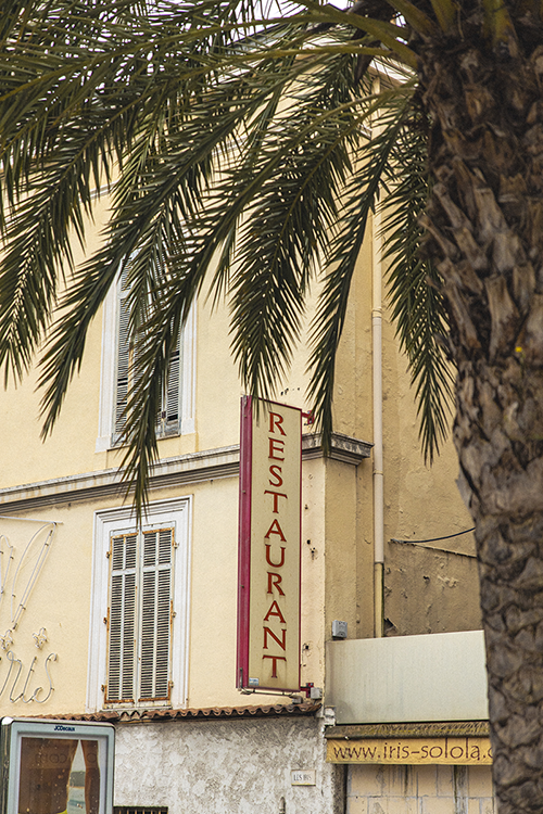 A restaurant sign in the French town of Bauduen