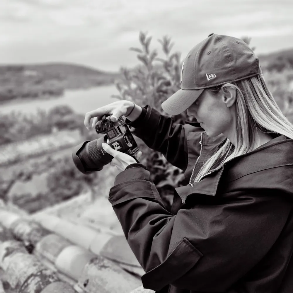 Kasia Bryjak taking a photo in the French town of Bauduen